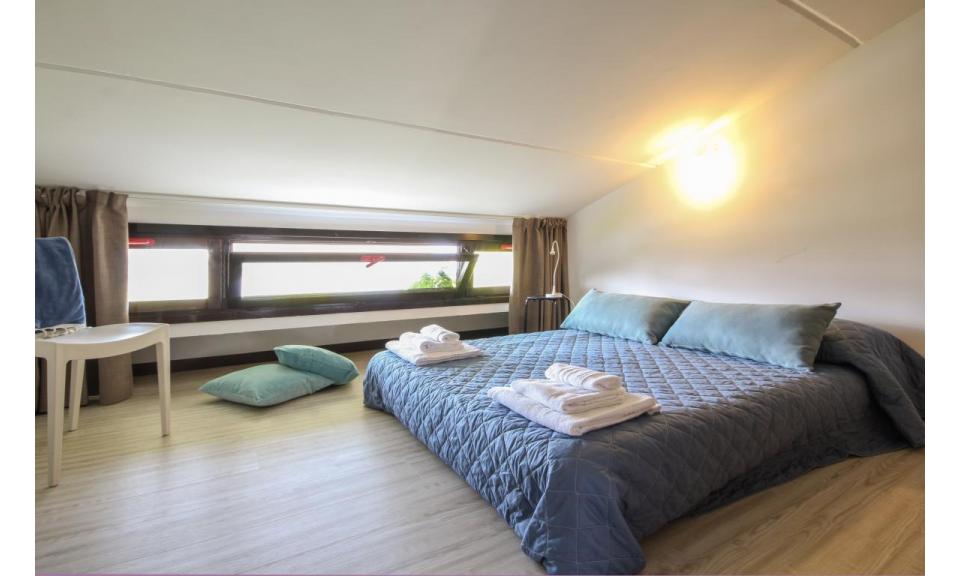 apartments TERRAMARE: E9/VSM - mansard roof bedroom (example)