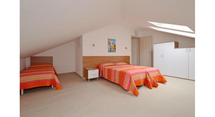 appartamenti FIORE: B4 - camera mansardata (esempio)
